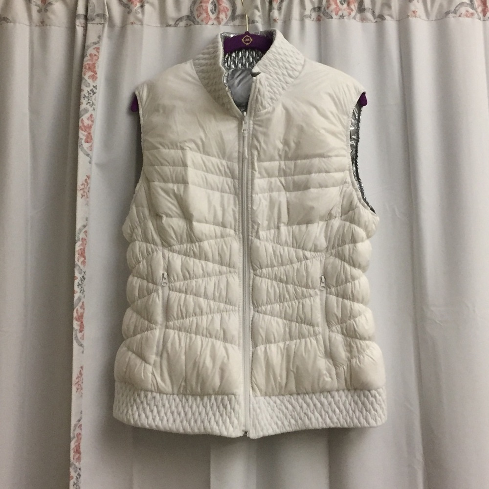 3/$25 White and silver reversible down vest.